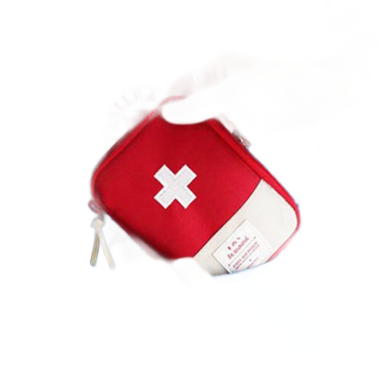 Trousse à pharmacie de voyage, compartiments et couleur vive, vue de face